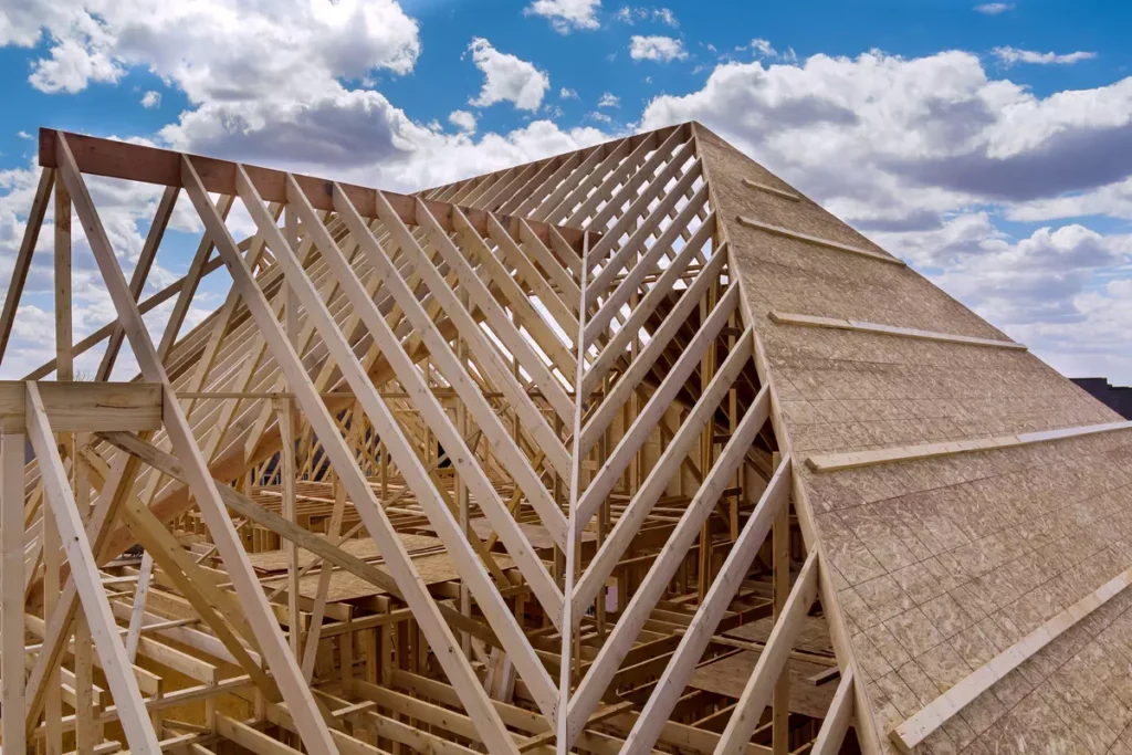 New wooden roof framing and beams